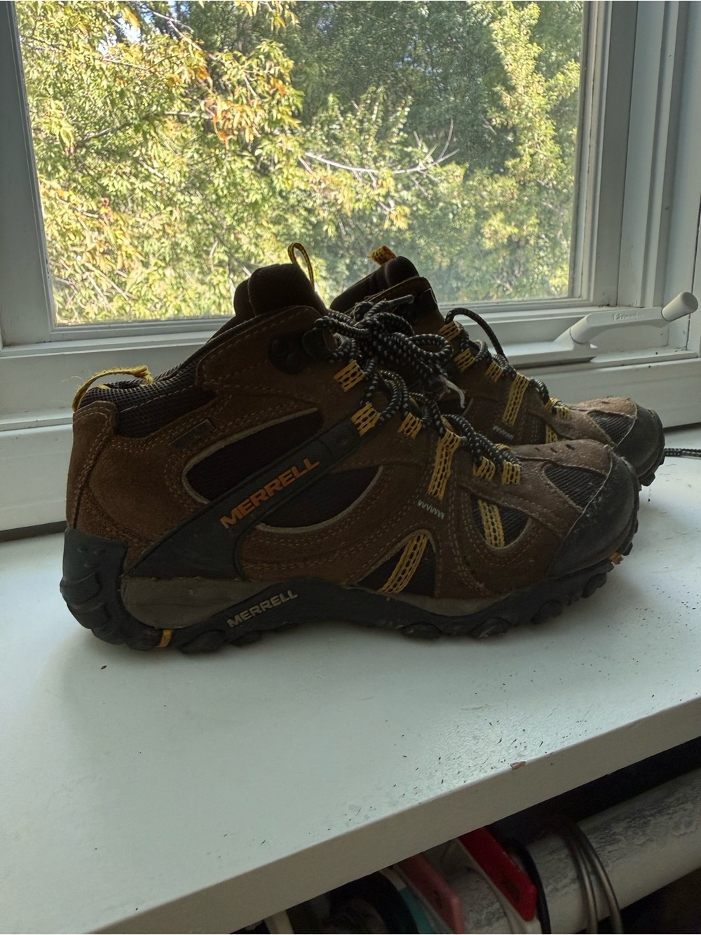 Merrell women’s Brown with Yellow Accent Trail Sneakers